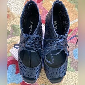 Jeffrey Campbell perforated black leather wedges size 6.